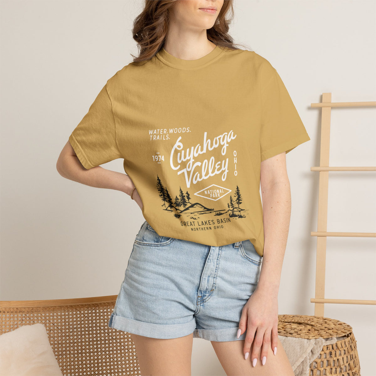 Golden Paw Print Wildlife Graphic Tee